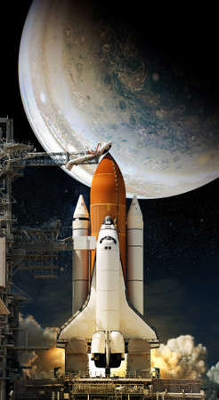 Space Shuttle takes off into space on jupiter background. Elements of this image furnishedの写真素材