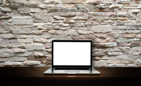 Modern laptop isolated on brick background. 3D Illustration.の写真素材