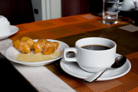 hot coffee whit sweet in the morningの写真素材