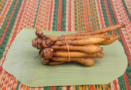 Ginger root bundle on  banana leaf