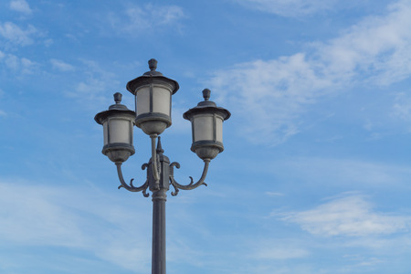 lamp on blue sky with cloud