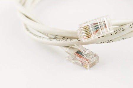 lan head with computer network cable on white background