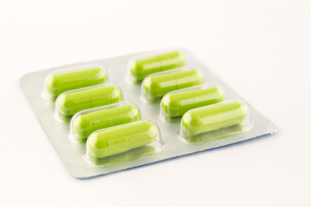 green antibiotic in blisterの写真素材
