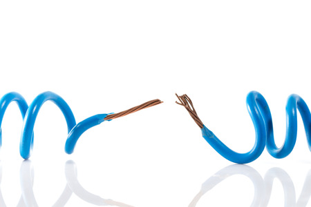 wire cable torn on whiteの写真素材