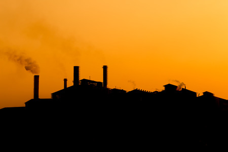 Silhouette of factory in warm toneの写真素材