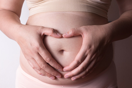 belly of pregnant womanの写真素材