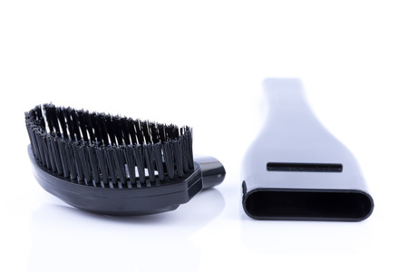 Brush vacuum cleaner on white backgroundの写真素材