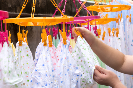 Diapers drying on a clothes lineの写真素材