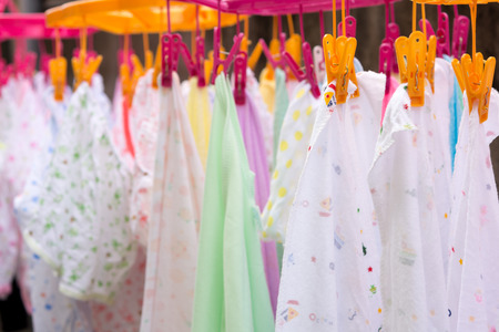 Diapers drying on a clothes lineの写真素材