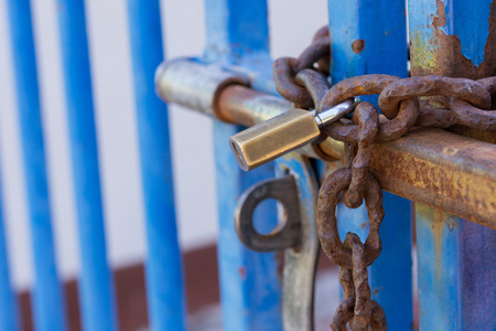 key of chain locked On the steel doorの写真素材