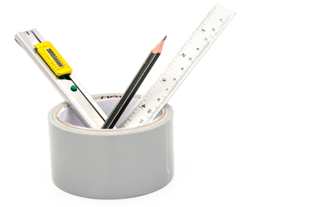 sticky tape with Cutter  Pencil and Ruler on whiteの写真素材