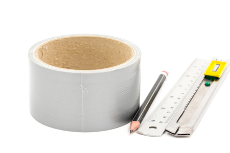 sticky tape with Cutter  Pencil and Ruler on whiteの写真素材