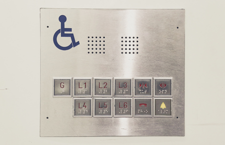 button inside the elevator for the disabledの写真素材