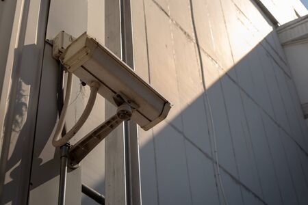 CCTV cameras installed on industrial wallsの写真素材