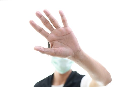 Depositphotos Stock Photos Coronavirus or covid 19, a man wearing a mask to protect against germs showing undesirable germs on a white backgrounの写真素材