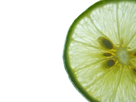 lime slice isolated on white backgroundの写真素材