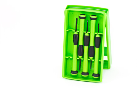 Green screwdriver set  on white backgroundの写真素材