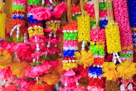 Colorful Thai plastic garland, can be found at any Buddhist Templeの写真素材