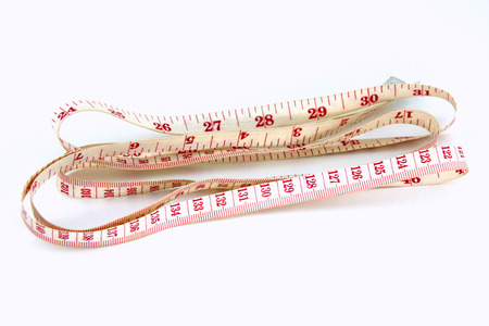 Measure tape. Isolated over white