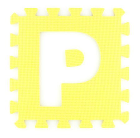 Alphabet puzzle pieces isolated white backgroundの写真素材
