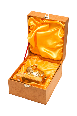 Golden Chinese Pig statue in box isolated on the white backgroundの写真素材