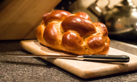 Swiss tresse bread with knife