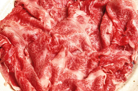 Beef sirloin on a white background, close-upの写真素材