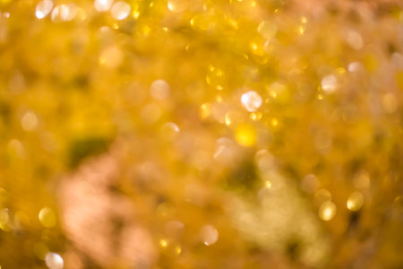 Abstract bokeh background of yellow defocused lights, abstract backgroundの写真素材