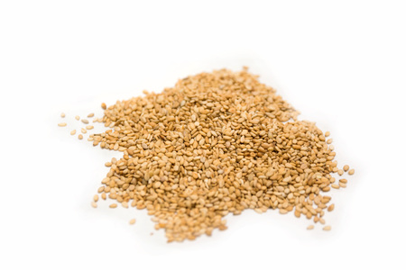 Pile of sesame seeds isolated on a white background. Vegan foodの写真素材