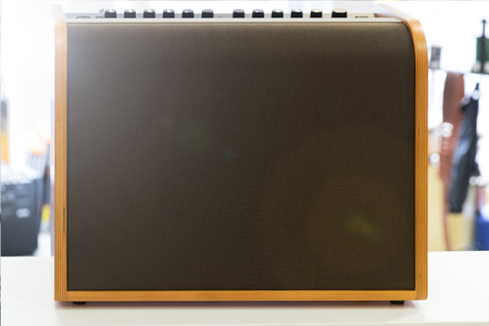 Guitar o bass amplifier isolated at music store background. Copy space. Lens flareの写真素材