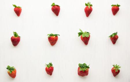 Fresh strawberries pattern on a white background. Strawberry textureの写真素材