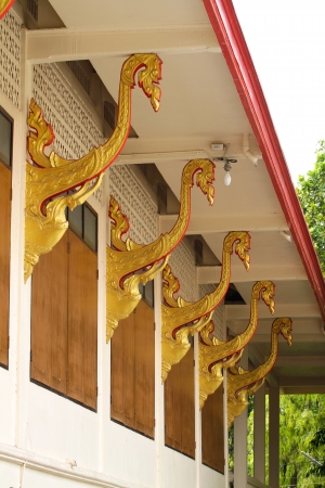 golden pattern decorative roof suspension of thai templeの写真素材