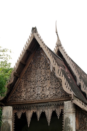 old wooden temple gable with broken tip の写真素材