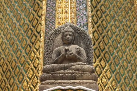 stone buddha image decorated at thai church exteriorの写真素材