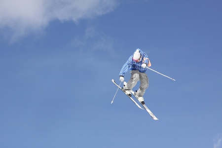 flying skier on mountainsの写真素材