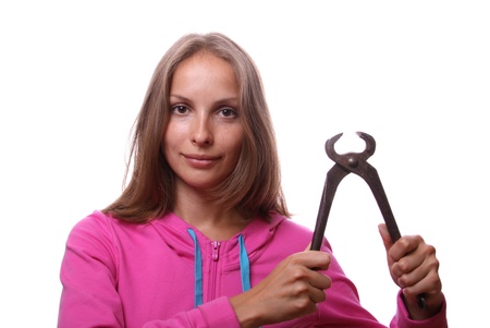 Woman with pliers, isolated