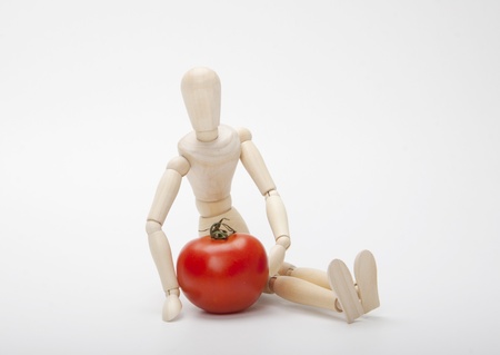 Mannequin and tomatoの写真素材