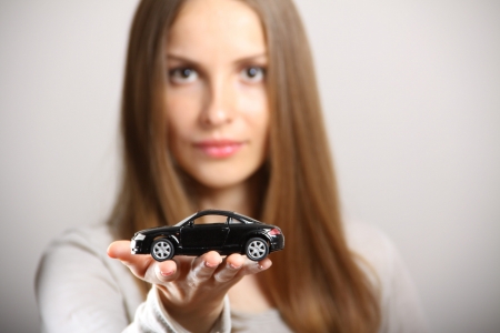 woman holding little carの写真素材