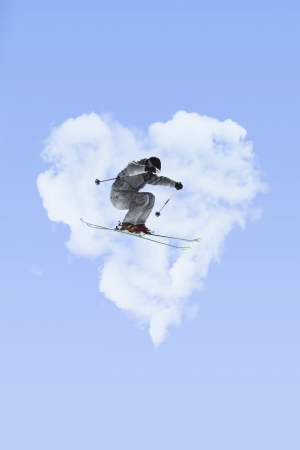 flying skier on mountains の写真素材
