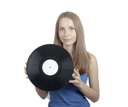 Girl with vinyl disc, isolated on whiteの写真素材