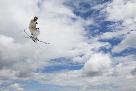 flying skier on mountains の写真素材