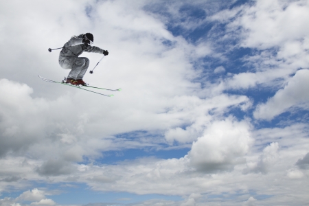 flying skier on mountainsの写真素材