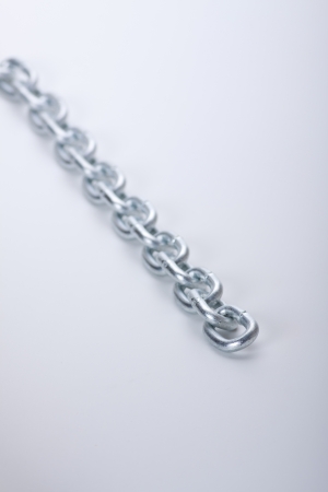 links of chain on a white backgroundの写真素材