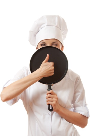 female cook   chef in white uniform with panの写真素材