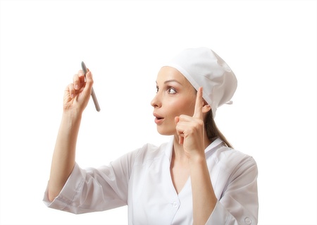 Doctor writing something with marker on glassの写真素材