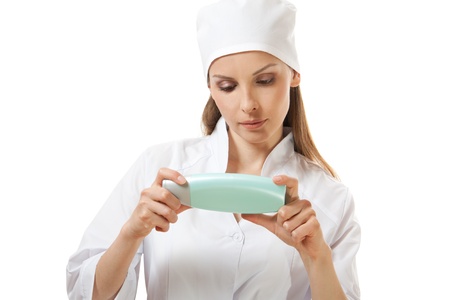 doctor presenting new medicine, isolated on whiteの写真素材