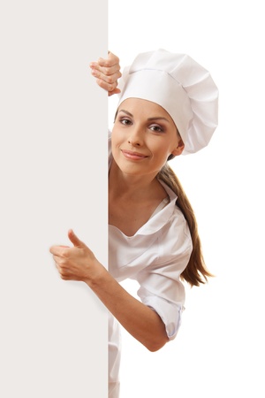 Woman cook holding paper sign, isolated on white backgroundの写真素材