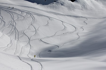 Freeride, tracks on a slope.の写真素材