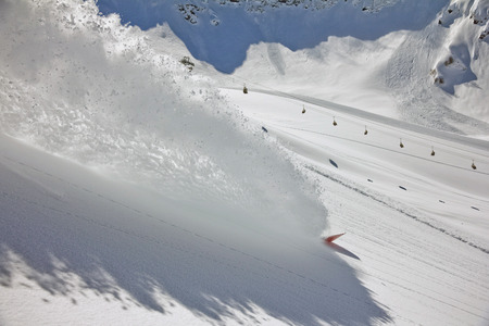 Skier in deep powder, extreme freeride