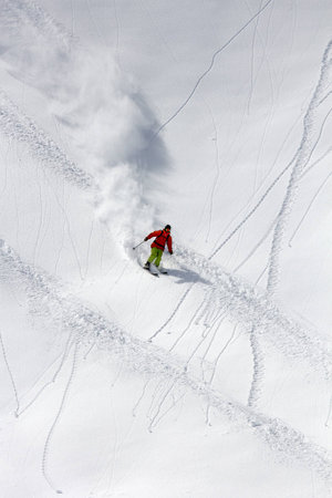 Skier in deep powder, extreme freerideの写真素材
